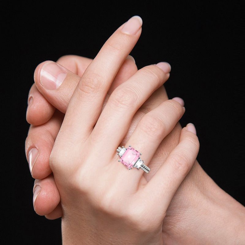 Emerald-cut Three Stone Ring