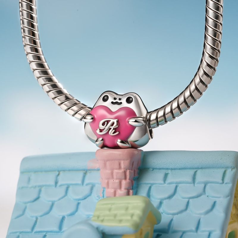 Frog Embraces Heart Charm
